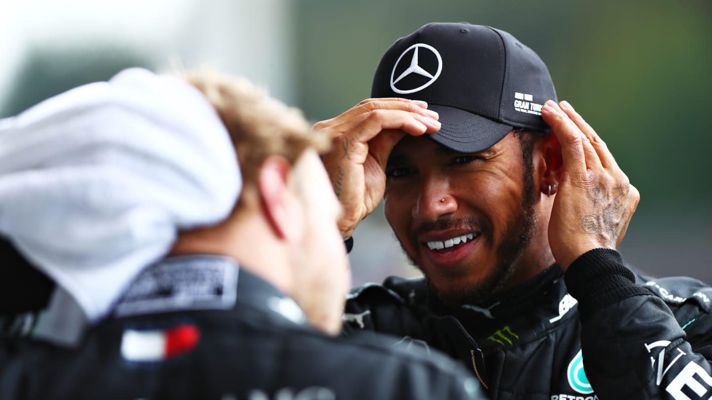 SPA, BELGIUM - AUGUST 30: Race winner Lewis Hamilton of Great Britain and Mercedes GP speaks with teammate and second placed Valtteri Bottas of Finland and Mercedes GP in parc ferme during the F1 Grand Prix of Belgium at Circuit de Spa-Francorchamps on August 30, 2020 in Spa, Belgium. (Photo by Dan Istitene - Formula 1/Formula 1 via Getty Images)