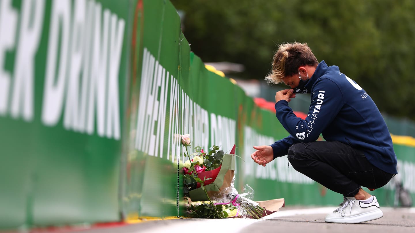 SPA, BELGIUM - AUGUST 27: Pierre Gasly of France and Scuderia AlphaTauri leaves flowers at the side