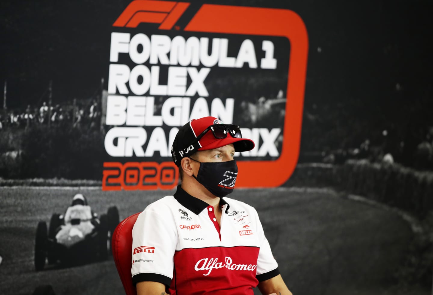 SPA, BELGIUM - AUGUST 27: Kimi Raikkonen of Finland and Alfa Romeo Racing talks in the Drivers