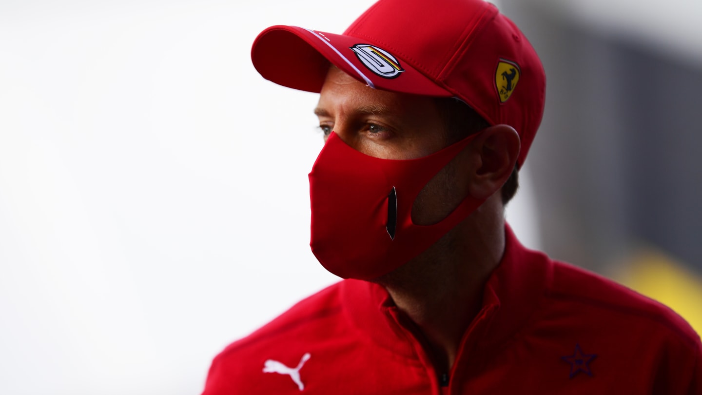 SPA, BELGIUM - AUGUST 27: Sebastian Vettel of Germany and Ferrari looks on during previews ahead of