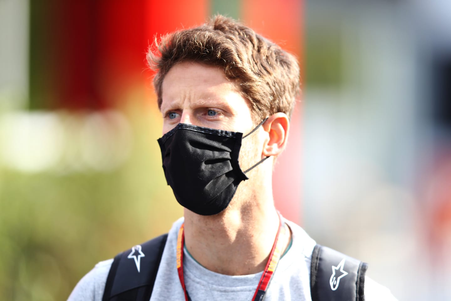 IMOLA, ITALY - OCTOBER 30: Romain Grosjean of France and Haas F1 walks in the Paddock during