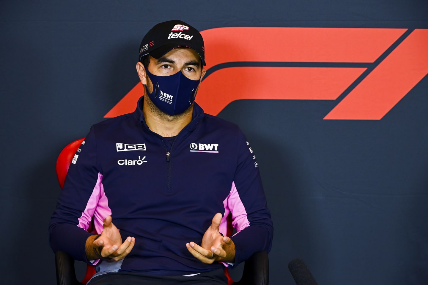 IMOLA, ITALY - OCTOBER 30: Sergio Perez of Mexico and Racing Point talks in the Drivers Press