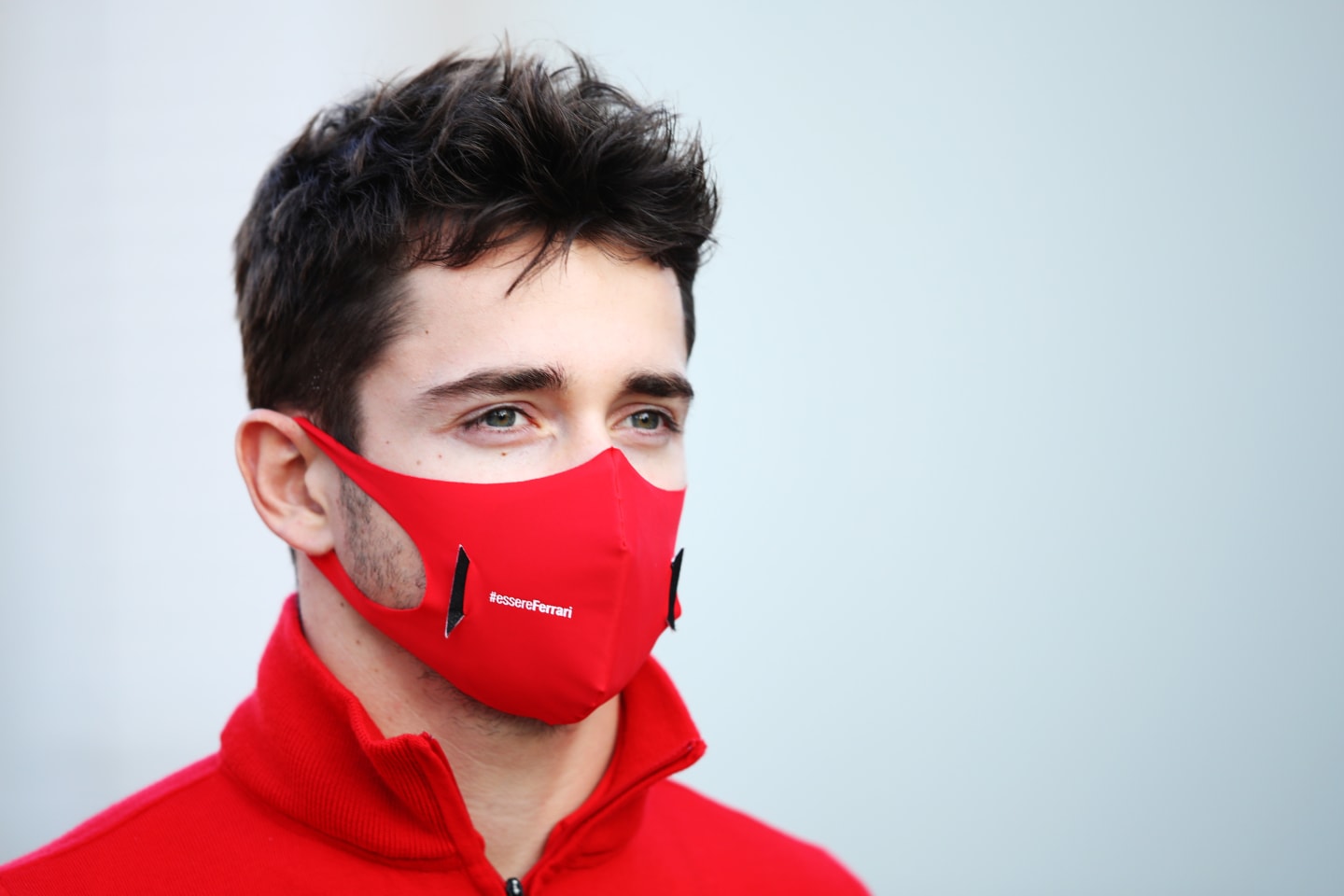IMOLA, ITALY - OCTOBER 30: Charles Leclerc of Monaco and Ferrari walks in the Paddock during