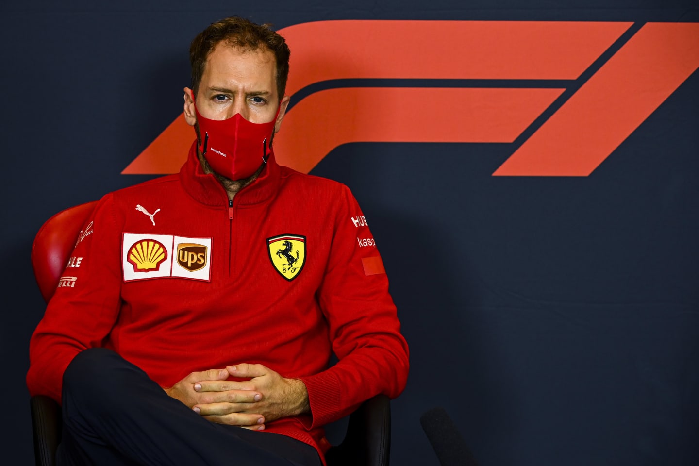 IMOLA, ITALY - OCTOBER 30: Sebastian Vettel of Germany and Ferrari talks in the Drivers Press
