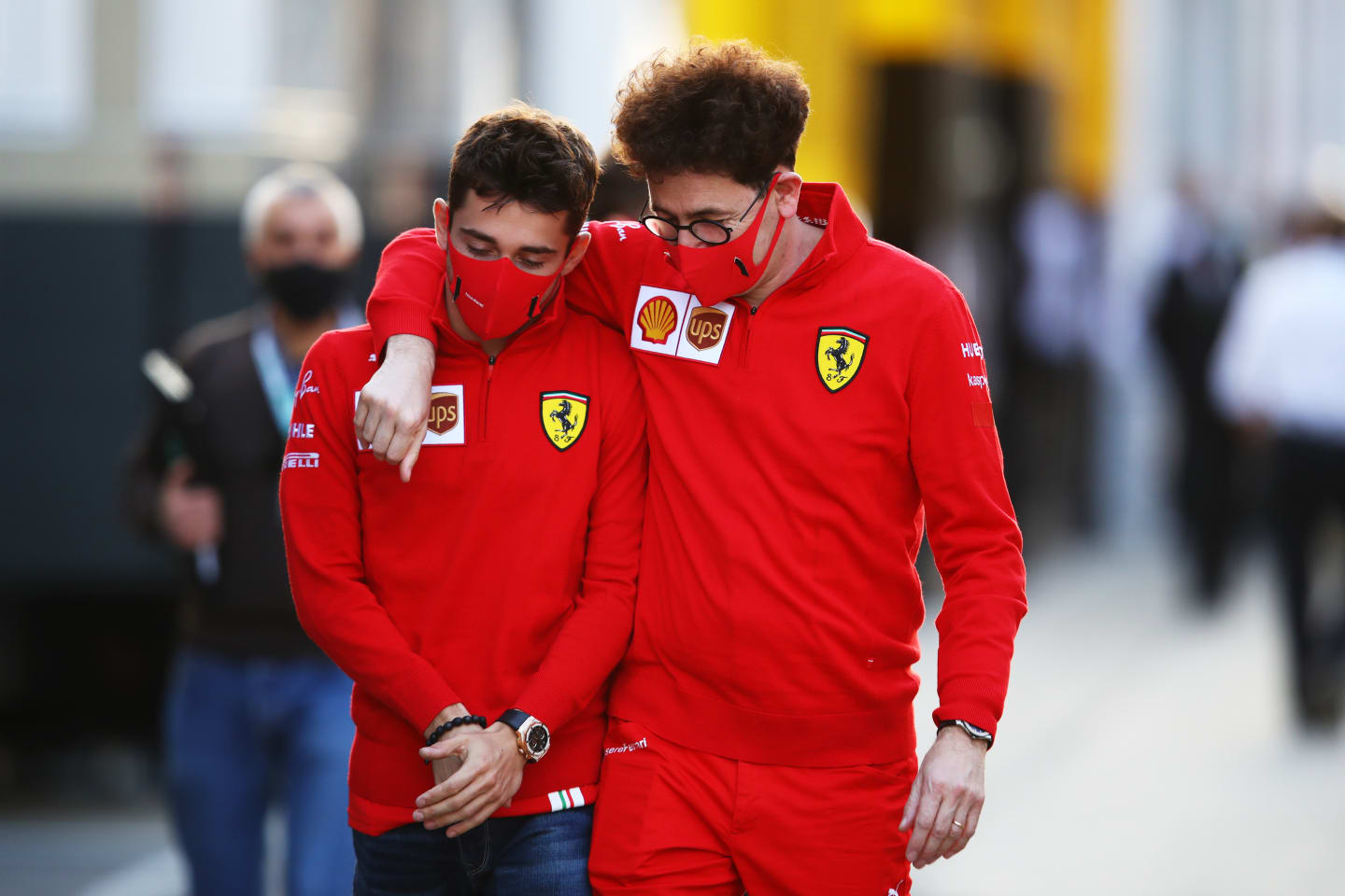 IMOLA, ITALY - OCTOBER 30: Scuderia Ferrari Team Principal Mattia Binotto embraces Charles Leclerc