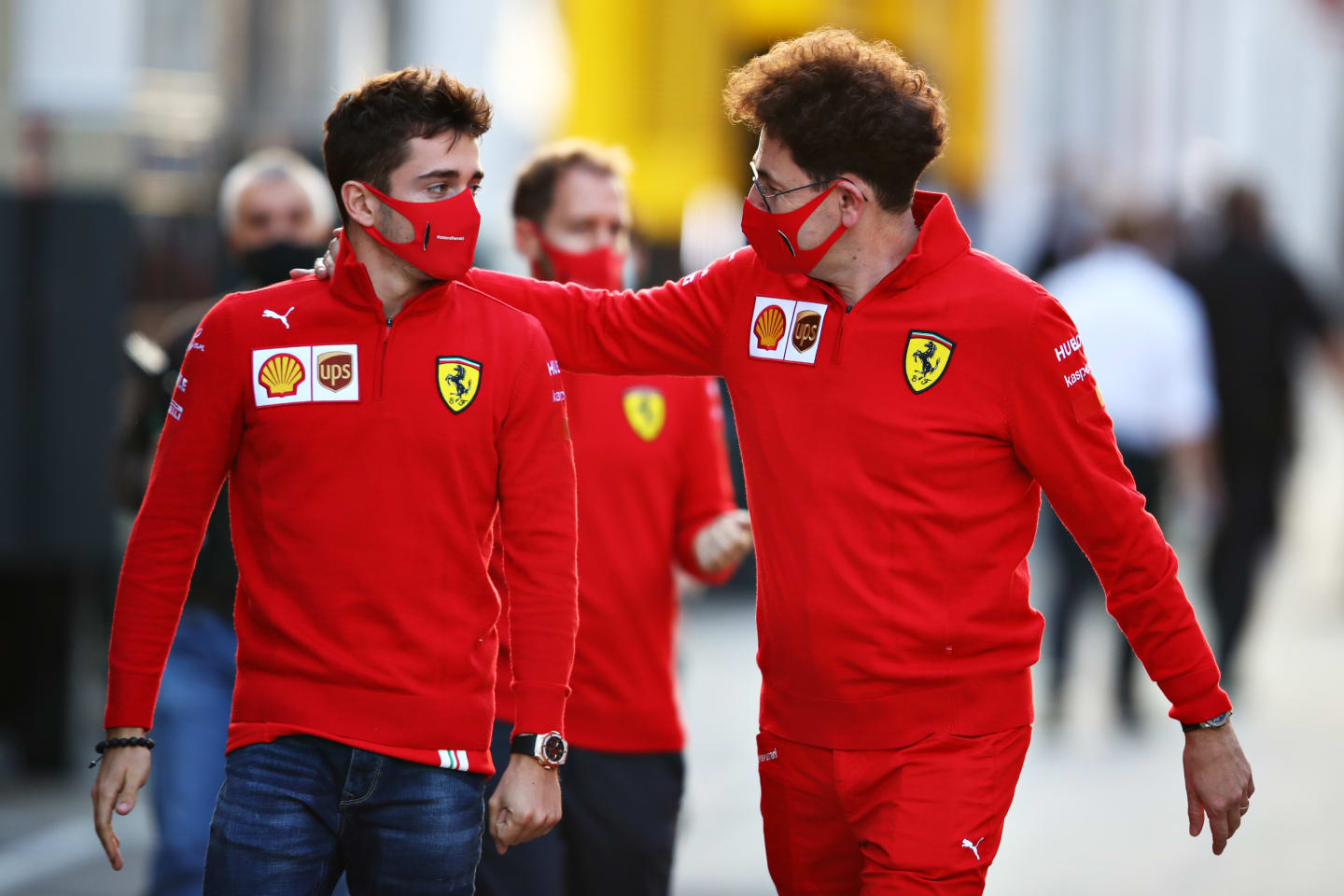 IMOLA, ITALY - OCTOBER 30: Scuderia Ferrari Team Principal Mattia Binotto embraces Charles Leclerc
