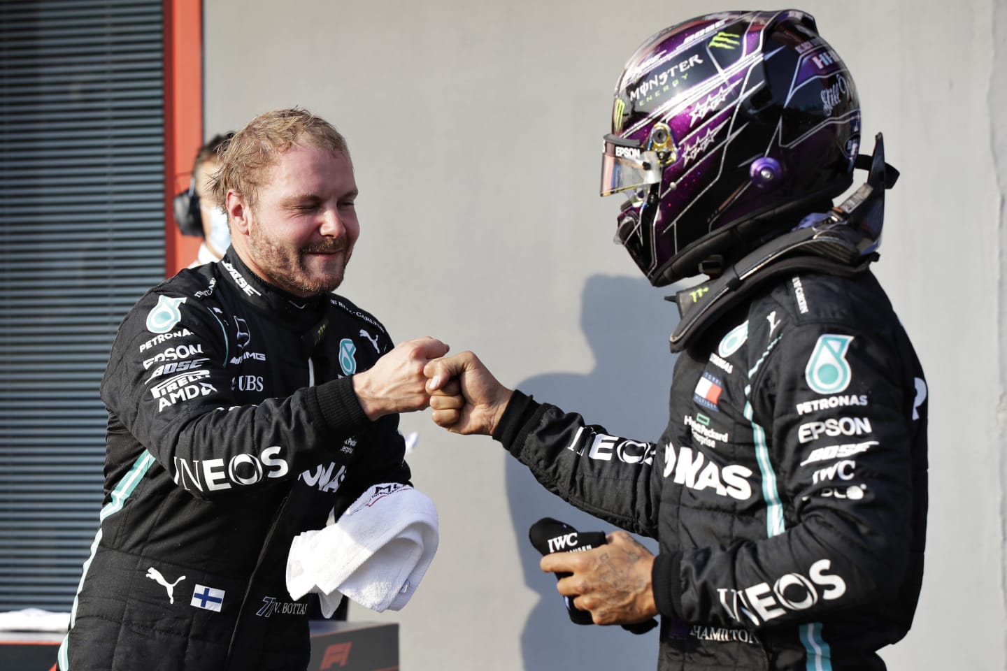 IMOLA, ITALY - OCTOBER 31: Pole position qualifier Valtteri Bottas of Finland and Mercedes GP bumps