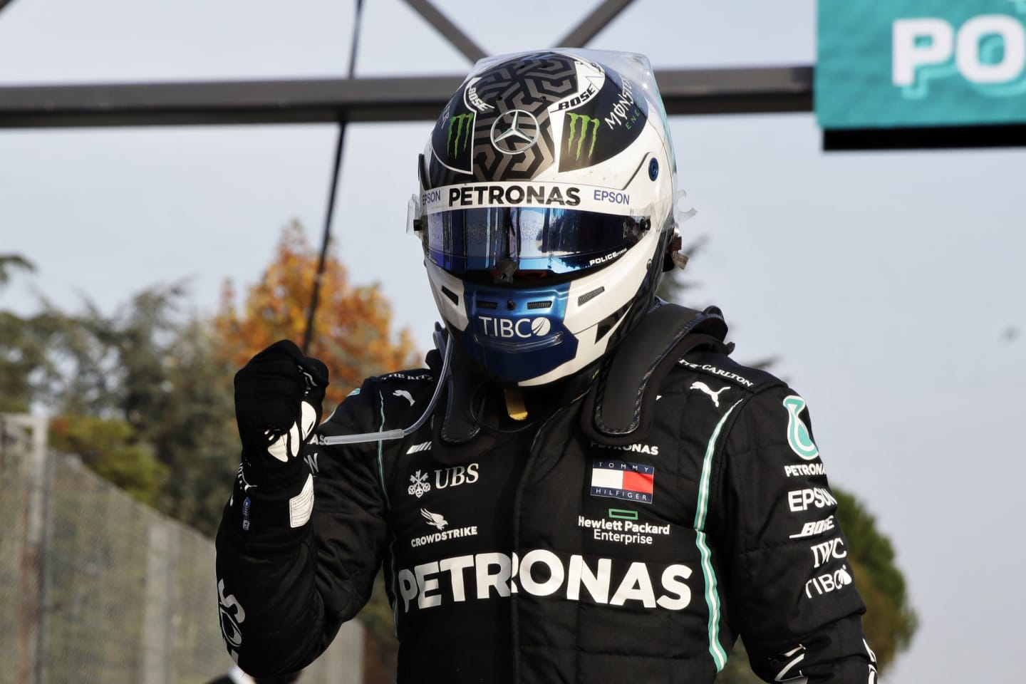 IMOLA, ITALY - OCTOBER 31: Pole position qualifier Valtteri Bottas of Finland and Mercedes GP climbs from his car in parc ferme during qualifying ahead of the F1 Grand Prix of Emilia Romagna at Autodromo Enzo e Dino Ferrari on October 31, 2020 in Imola, Italy. (Photo by Luca Bruno - Pool/Getty Images)
