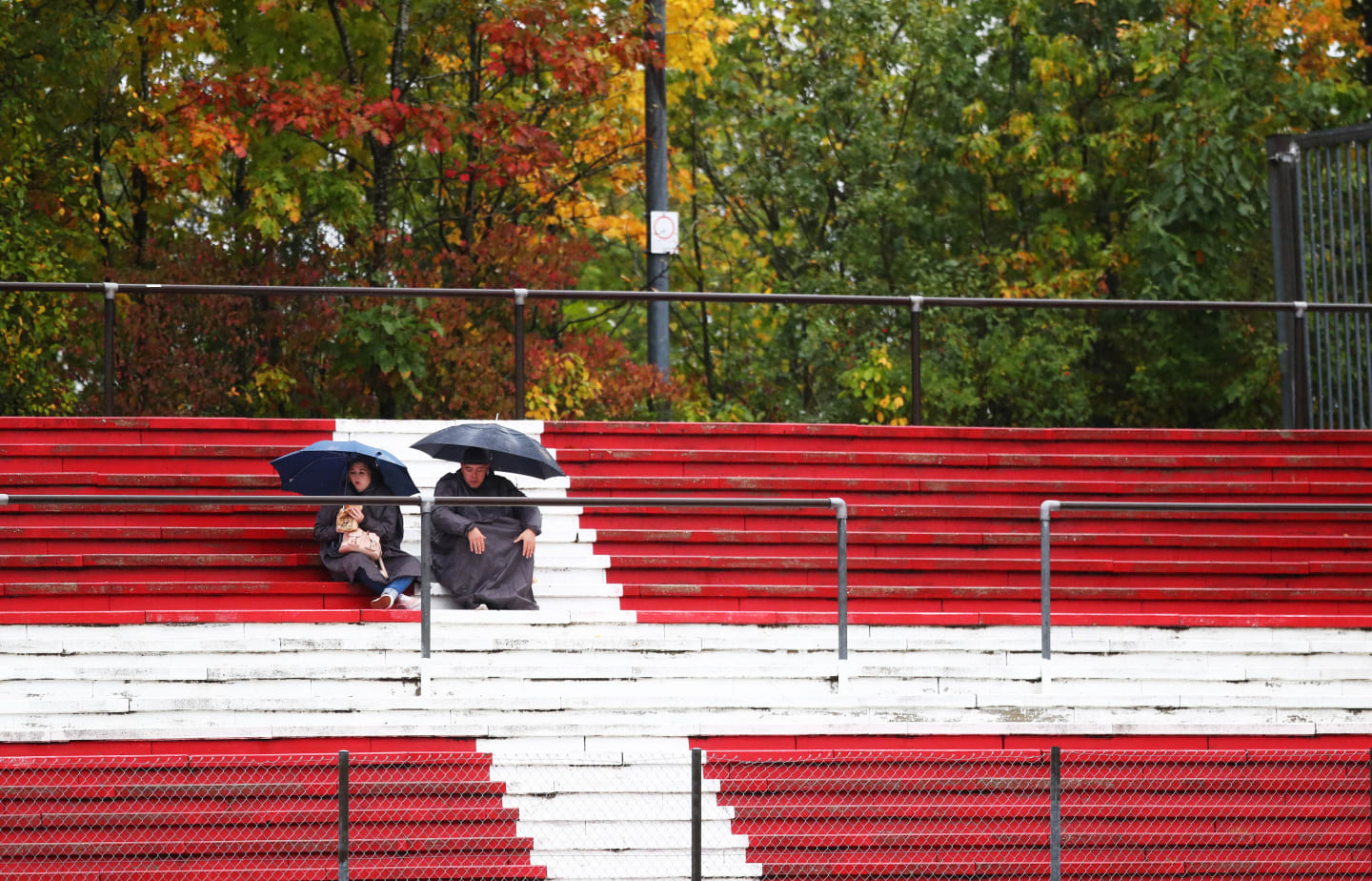 NUERBURG, GERMANY - OCTOBER 09: Fans wait for the action to start in the grandstands during
