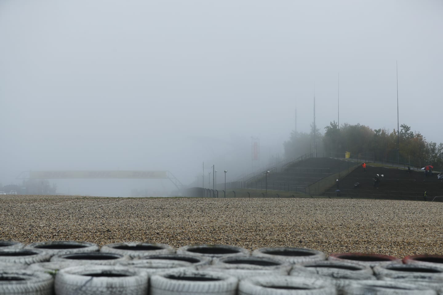 NUERBURG, GERMANY - OCTOBER 09: Fog is pictured over the circuit during practice ahead of the F1