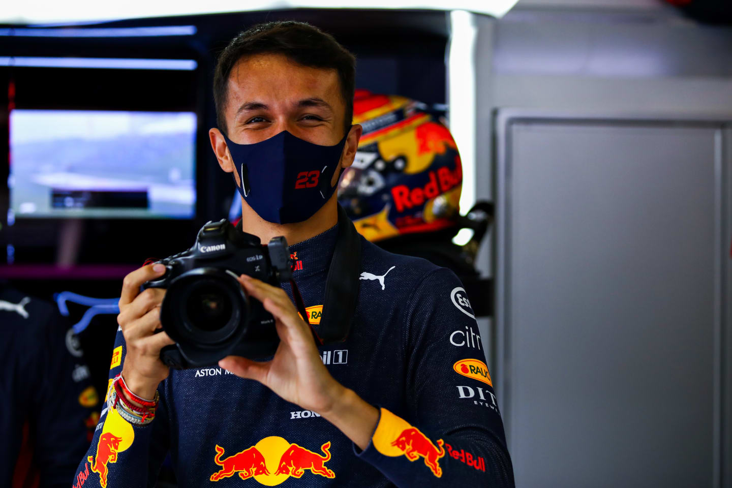 NUERBURG, GERMANY - OCTOBER 09: Alexander Albon of Thailand and Red Bull Racing takes a photo in