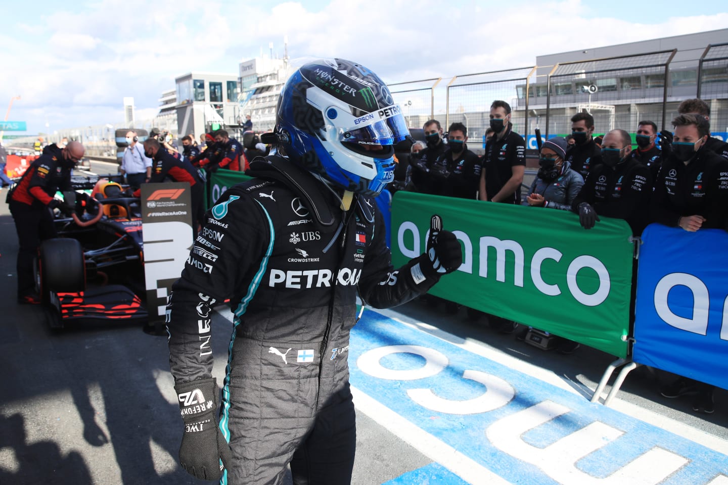 NUERBURG, GERMANY - OCTOBER 10: Pole position qualifier Valtteri Bottas of Finland and Mercedes GP celebrates in parc ferme during qualifying ahead of the F1 Eifel Grand Prix at Nuerburgring on October 10, 2020 in Nuerburg, Germany. (Photo by Wolfgang Rattay - Pool/Getty Images)