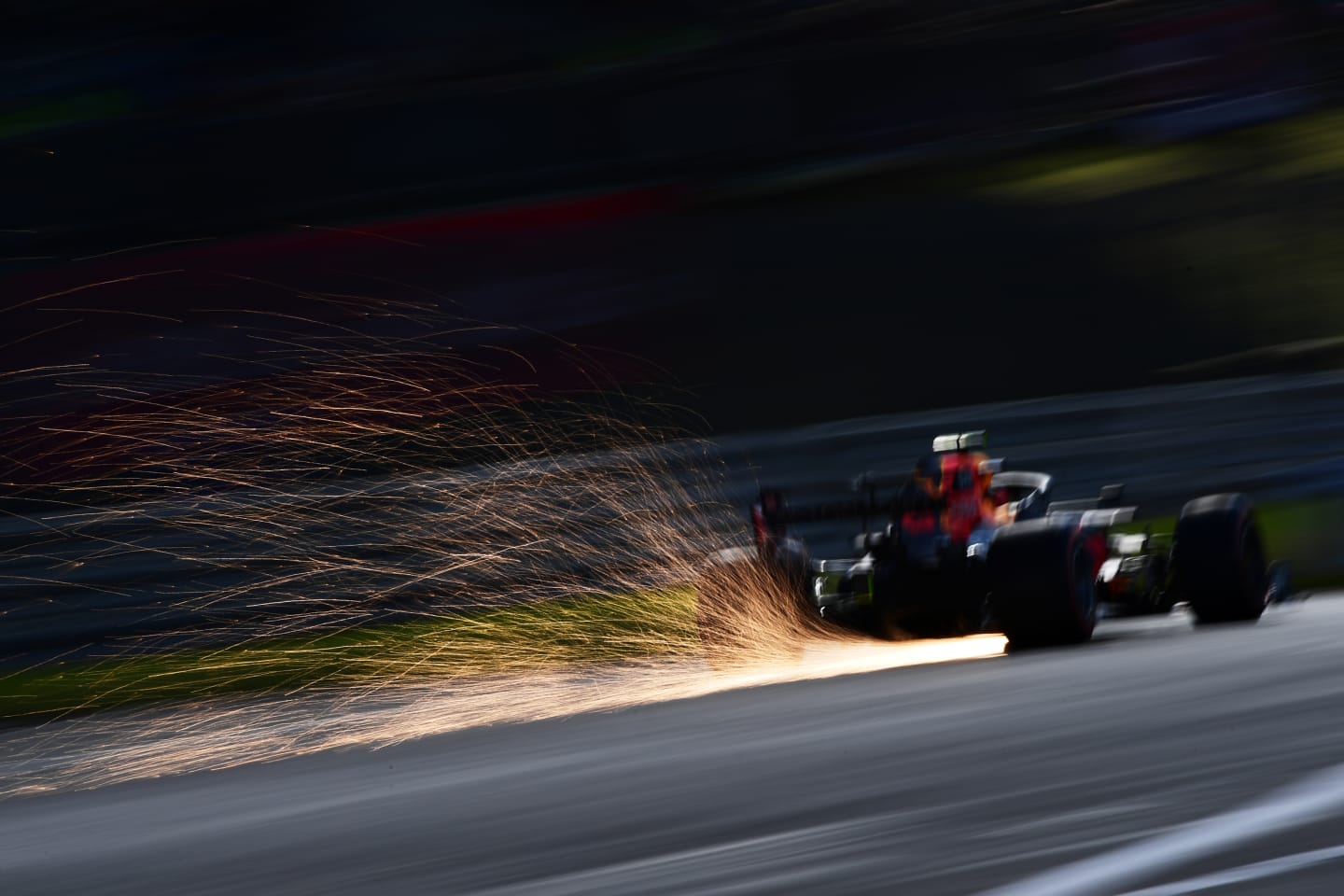 NUERBURG, GERMANY - OCTOBER 10: Sparks fly behind Max Verstappen of the Netherlands driving the (33) Aston Martin Red Bull Racing RB16 during qualifying ahead of the F1 Eifel Grand Prix at Nuerburgring on October 10, 2020 in Nuerburg, Germany. (Photo by Mario Renzi - Formula 1/Formula 1 via Getty Images)
