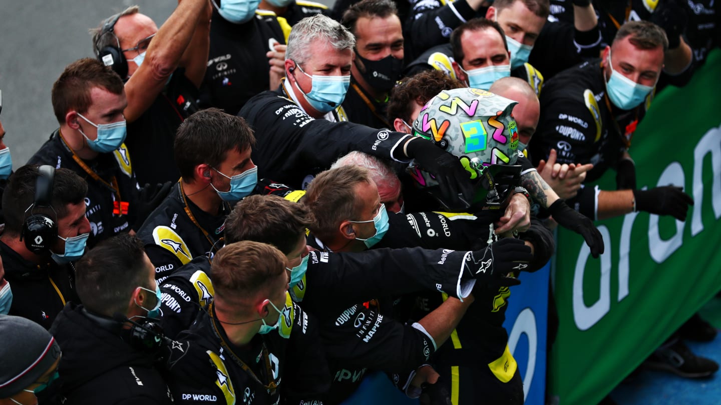 NUERBURG, GERMANY - OCTOBER 11: Third placed Daniel Ricciardo of Australia and Renault Sport F1 celebrates with team members in parc ferme during the F1 Eifel Grand Prix at Nuerburgring on October 11, 2020 in Nuerburg, Germany. (Photo by Dan Istitene - Formula 1/Formula 1 via Getty Images)