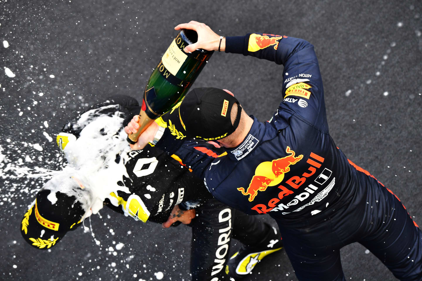 NUERBURG, GERMANY - OCTOBER 11: Daniel Ricciardo of Renault and Second placed Max Verstappen of Netherlands and Red Bull Racing celebrate on the podium during the F1 Eifel Grand Prix at Nuerburgring on October 11, 2020 in Nuerburg, Germany. (Photo by Getty Images/Getty Images)