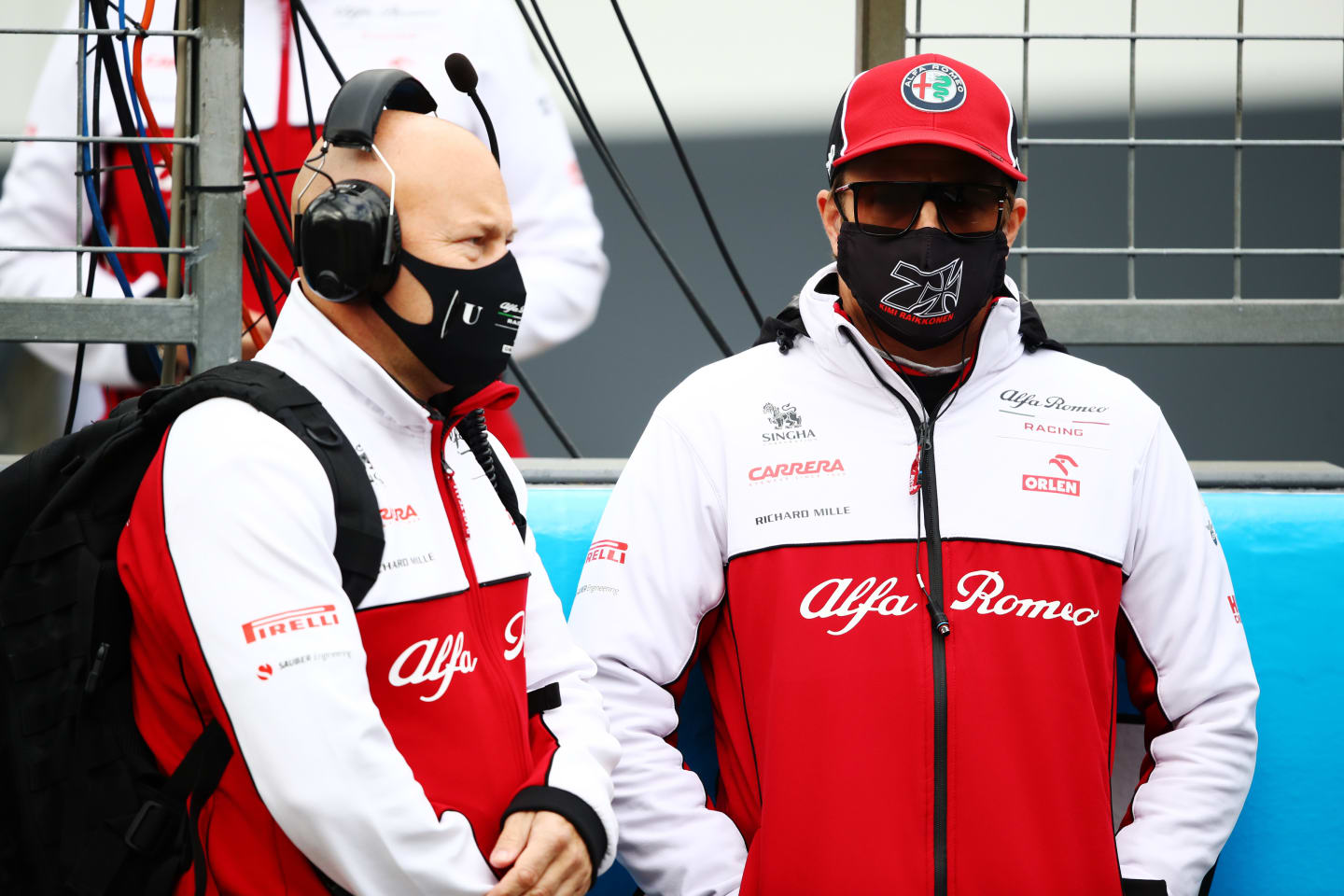 NUERBURG, GERMANY - OCTOBER 11: Kimi Raikkonen of Finland and Alfa Romeo Racing looks on as he