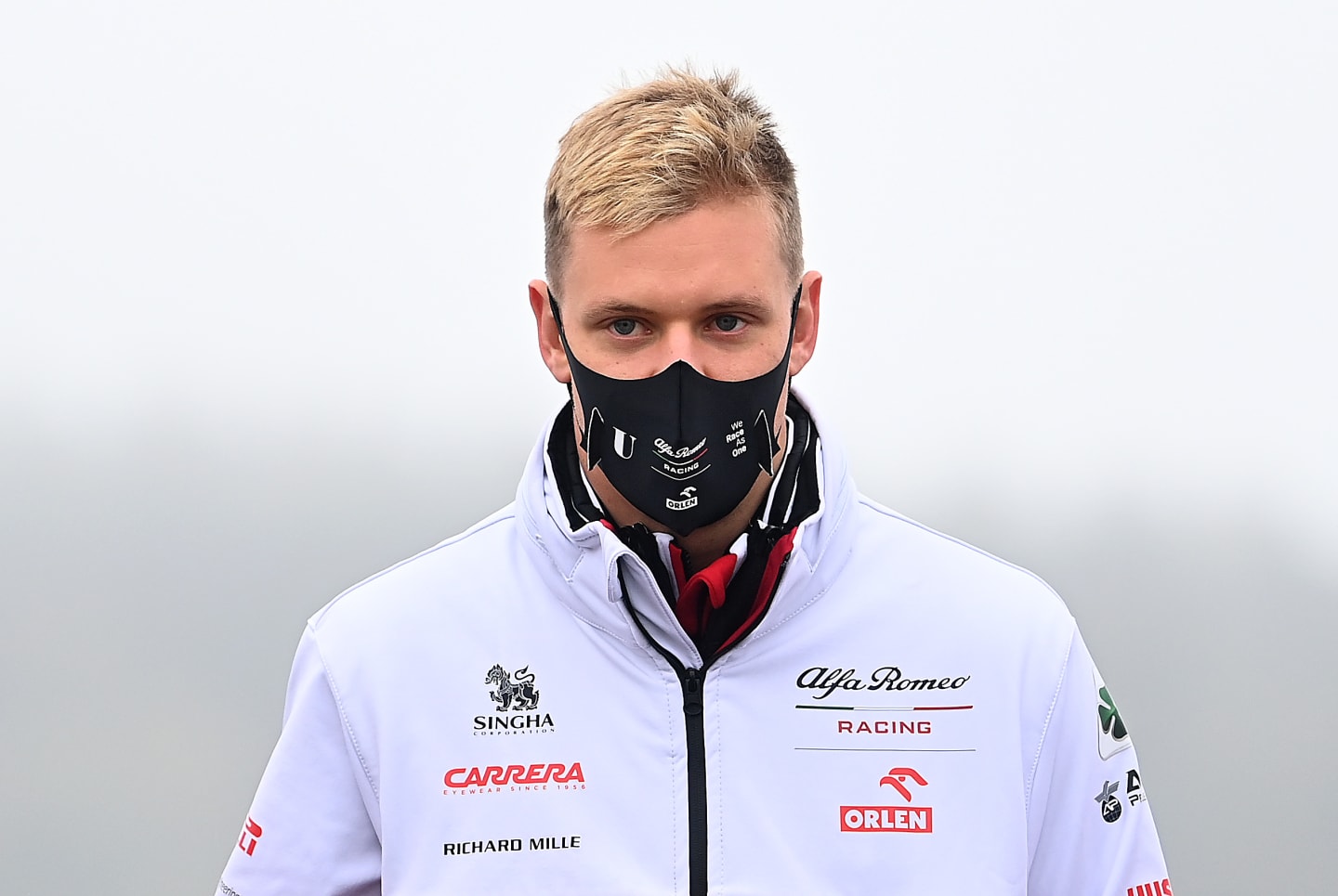 NUERBURG, GERMANY - OCTOBER 08: Mick Schumacher of Germany and Alfa Romeo Racing walks the track