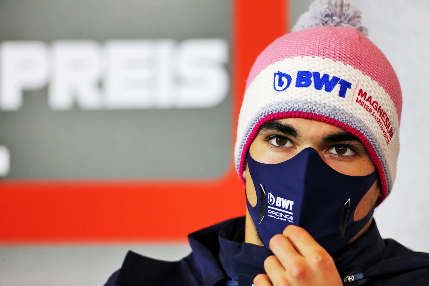 NUERBURG, GERMANY - OCTOBER 08: Lance Stroll of Canada and Racing Point talks in the Drivers Press