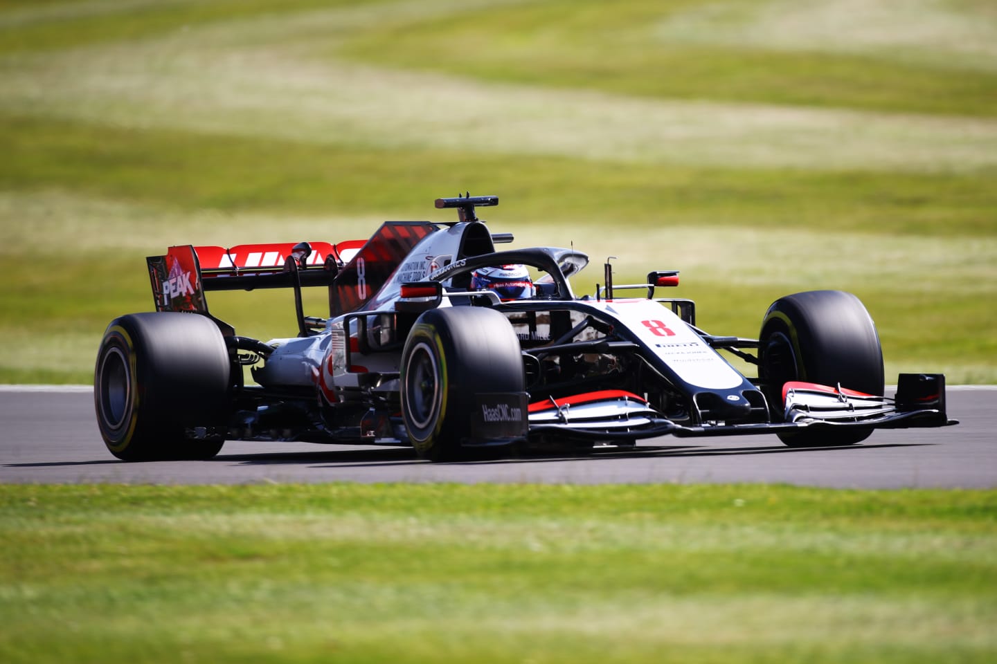 NORTHAMPTON, ENGLAND - JULY 31: Romain Grosjean of France driving the (8) Haas F1 Team VF-20 Ferrari on track during practice for the F1 Grand Prix of Great Britain at Silverstone on July 31, 2020 in Northampton, England. (Photo by Bryn Lennon/Getty Images)