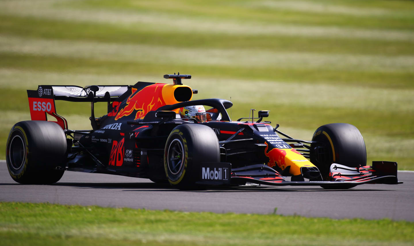 NORTHAMPTON, ENGLAND - JULY 31: Max Verstappen of the Netherlands driving the (33) Aston Martin Red