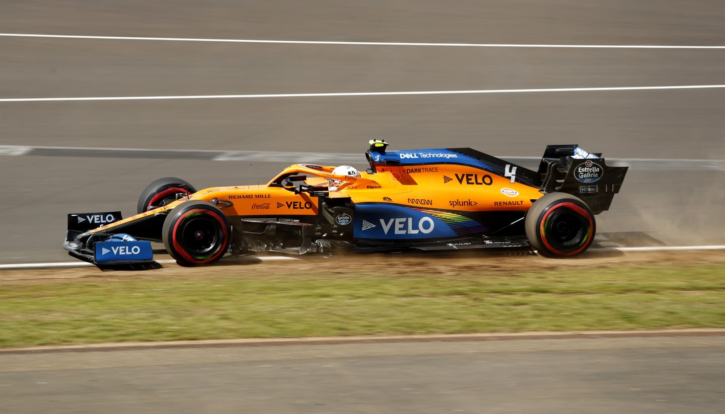 NORTHAMPTON, ENGLAND - AUGUST 01: Lando Norris of Great Britain driving the (4) McLaren F1 Team MCL35 Renault runs wide during qualifying for the F1 Grand Prix of Great Britain at Silverstone on August 01, 2020 in Northampton, England. (Photo by Andrew Boyers/Pool via Getty Images)