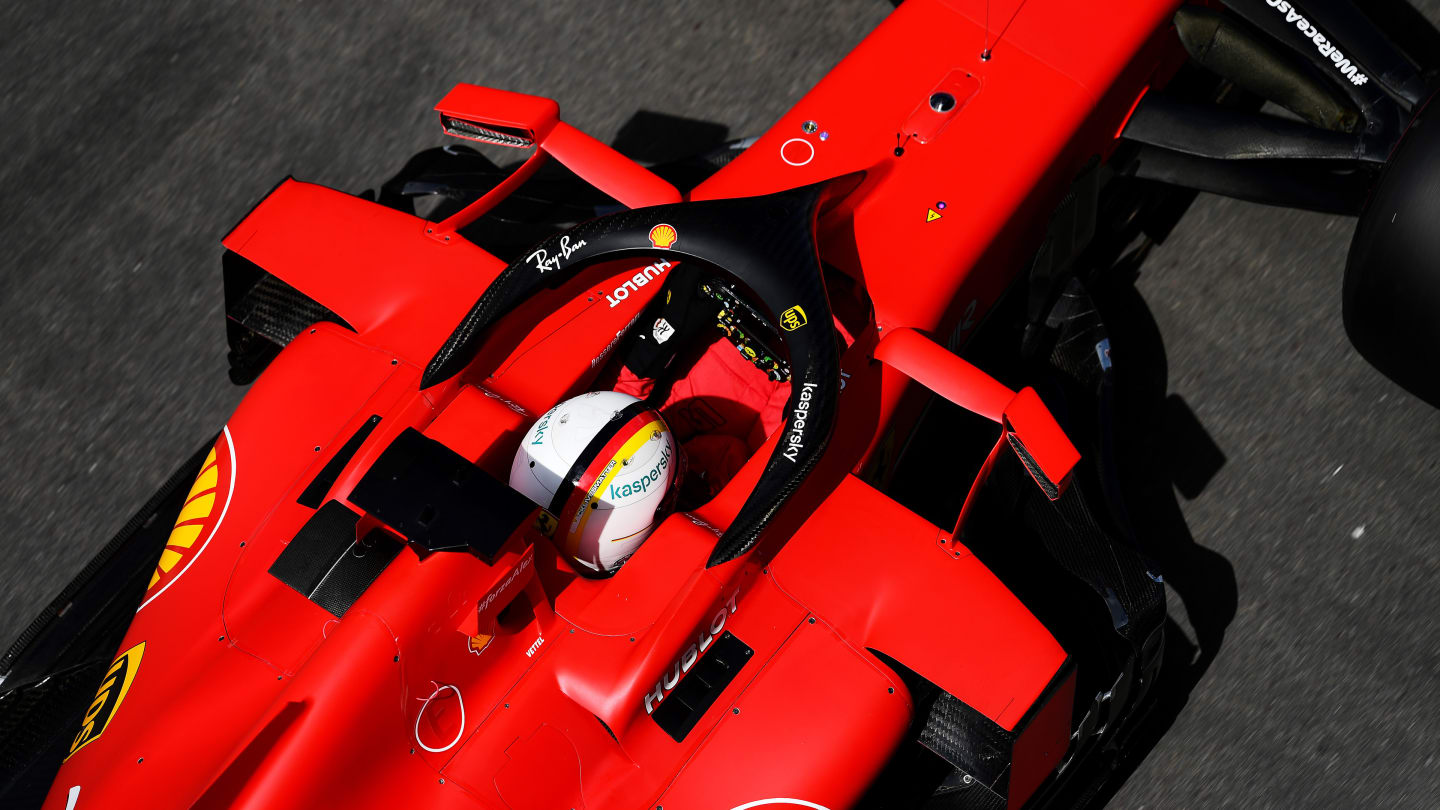 NORTHAMPTON, ENGLAND - AUGUST 01: Sebastian Vettel of Germany driving the (5) Scuderia Ferrari