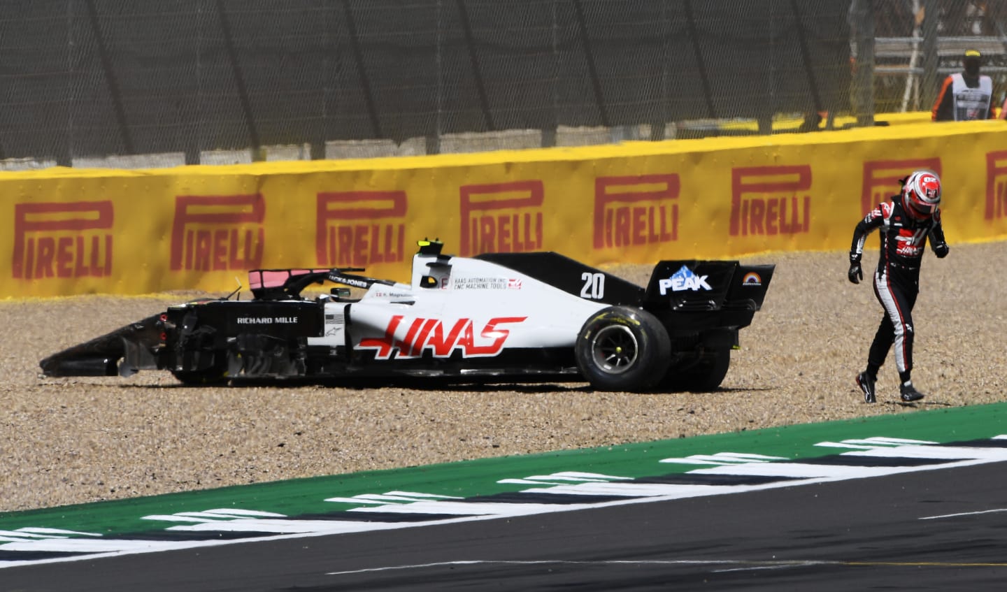 NORTHAMPTON, ENGLAND - AUGUST 02:  Kevin Magnussen of Denmark driving the (20) Haas F1 Team VF-20 Ferrari leaves his car after spinning off during the F1 Grand Prix of Great Britain at Silverstone on August 02, 2020 in Northampton, England. (Photo by Rudy Carezzevoli/Getty Images)