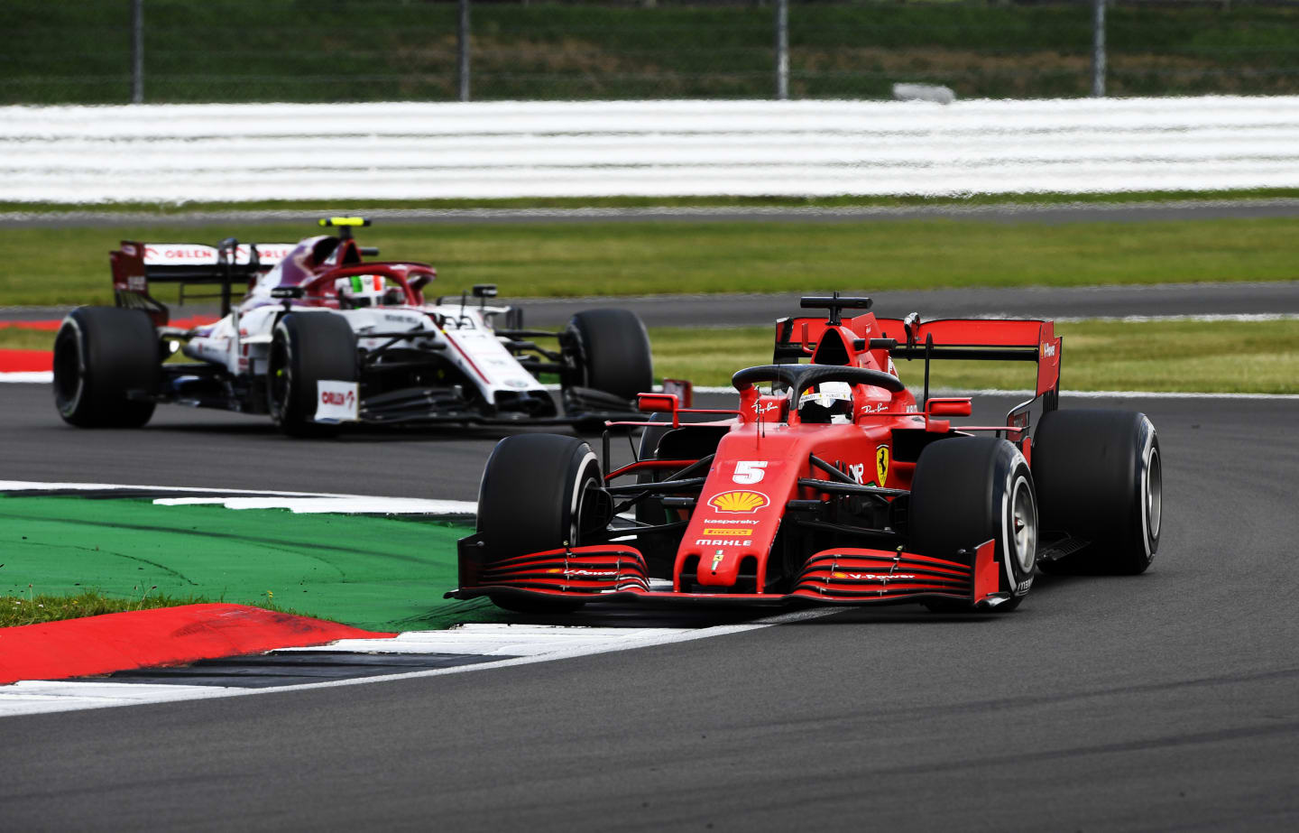 NORTHAMPTON, ENGLAND - AUGUST 02: Sebastian Vettel of Germany driving the (5) Scuderia Ferrari