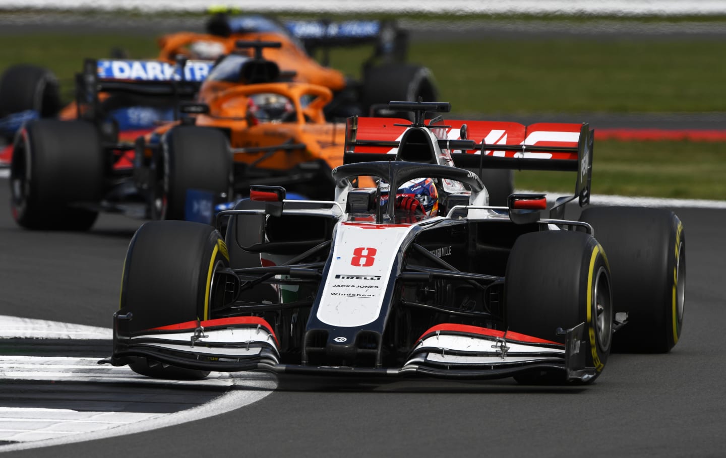 NORTHAMPTON, ENGLAND - AUGUST 02: Romain Grosjean of France driving the (8) Haas F1 Team VF-20