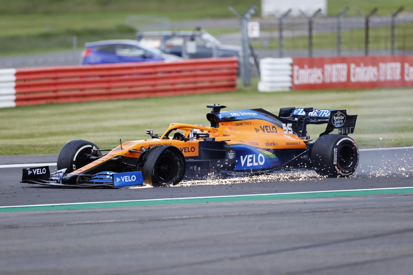 NORTHAMPTON, ENGLAND - AUGUST 02: Carlos Sainz of Spain driving the (55) McLaren F1 Team MCL35