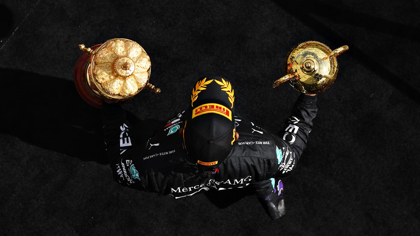 NORTHAMPTON, ENGLAND - AUGUST 02: Race winner Lewis Hamilton of Great Britain and Mercedes GP