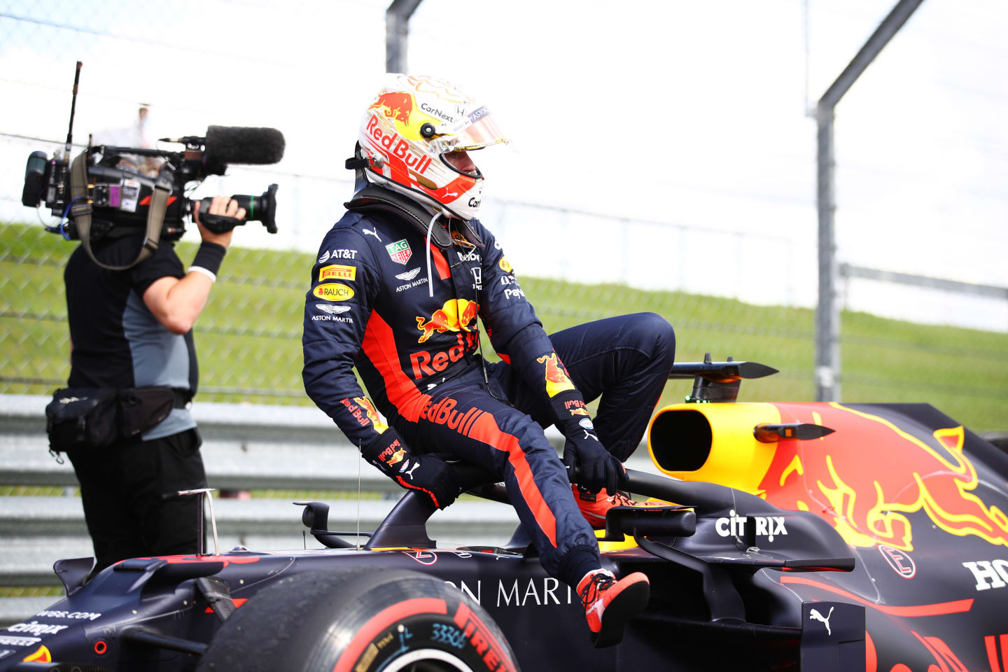 NORTHAMPTON, ENGLAND - AUGUST 02: Max Verstappen of Netherlands and Red Bull Racing climbs out of
