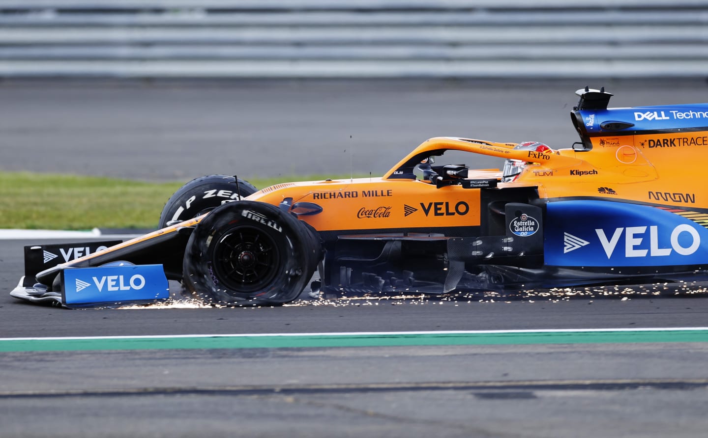 NORTHAMPTON, ENGLAND - AUGUST 02: Carlos Sainz of Spain driving the (55) McLaren F1 Team MCL35 Renault on track with a punctured tyre during the F1 Grand Prix of Great Britain at Silverstone on August 02, 2020 in Northampton, England. (Photo by Andrew Boyers/Pool via Getty Images)
