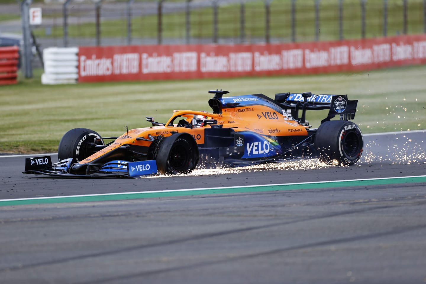 NORTHAMPTON, ENGLAND - AUGUST 02: Carlos Sainz of Spain driving the (55) McLaren F1 Team MCL35