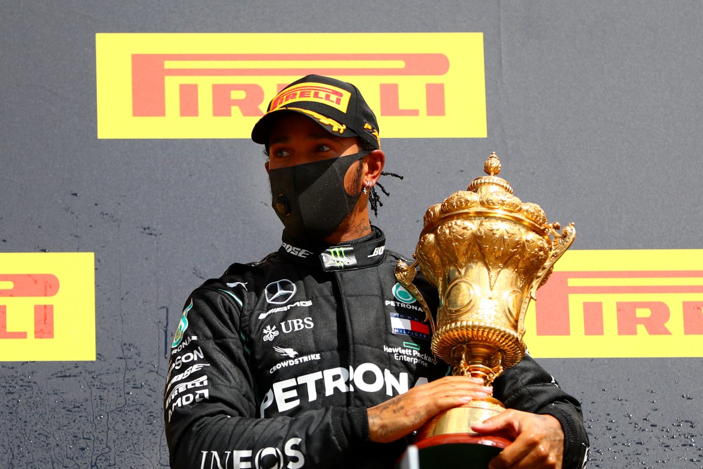 NORTHAMPTON, ENGLAND - AUGUST 02: Lewis Hamilton of Great Britain and Mercedes GP celebrates on the podium after winning the Formula One Grand Prix of Hungary at Silverstone on August 02, 2020 in Northampton, England. (Photo by Dan Istitene - Formula 1/Formula 1 via Getty Images)