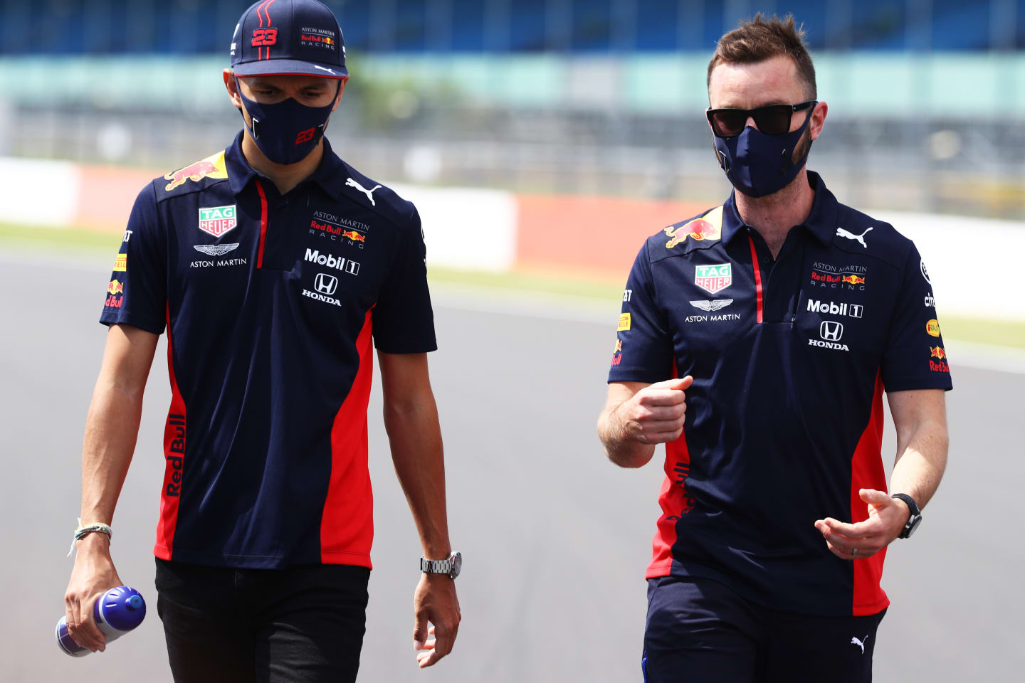 NORTHAMPTON, ENGLAND - JULY 30: Alexander Albon of Thailand and Red Bull Racing walks on track with