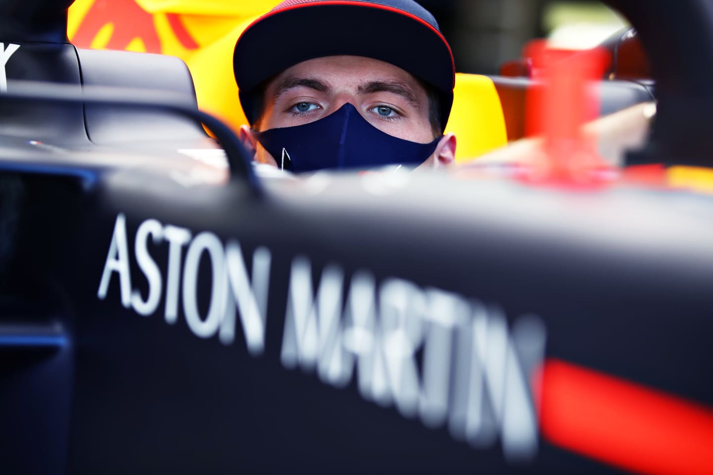 NORTHAMPTON, ENGLAND - JULY 30: Max Verstappen of Netherlands and Red Bull Racing sits in his car