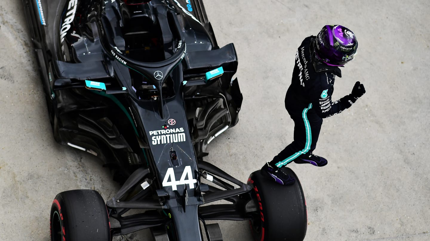 BUDAPEST, HUNGARY - JULY 18: Pole position qualifier Lewis Hamilton of Great Britain and Mercedes