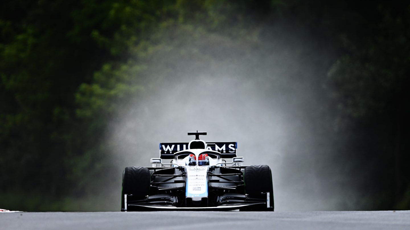 BUDAPEST, HUNGARY - JULY 19: George Russell of Great Britain driving the (63) Williams Racing FW43 Mercedes on the way to the grid before the Formula One Grand Prix of Hungary at Hungaroring on July 19, 2020 in Budapest, Hungary. (Photo by Clive Mason - Formula 1/Formula 1 via Getty Images)