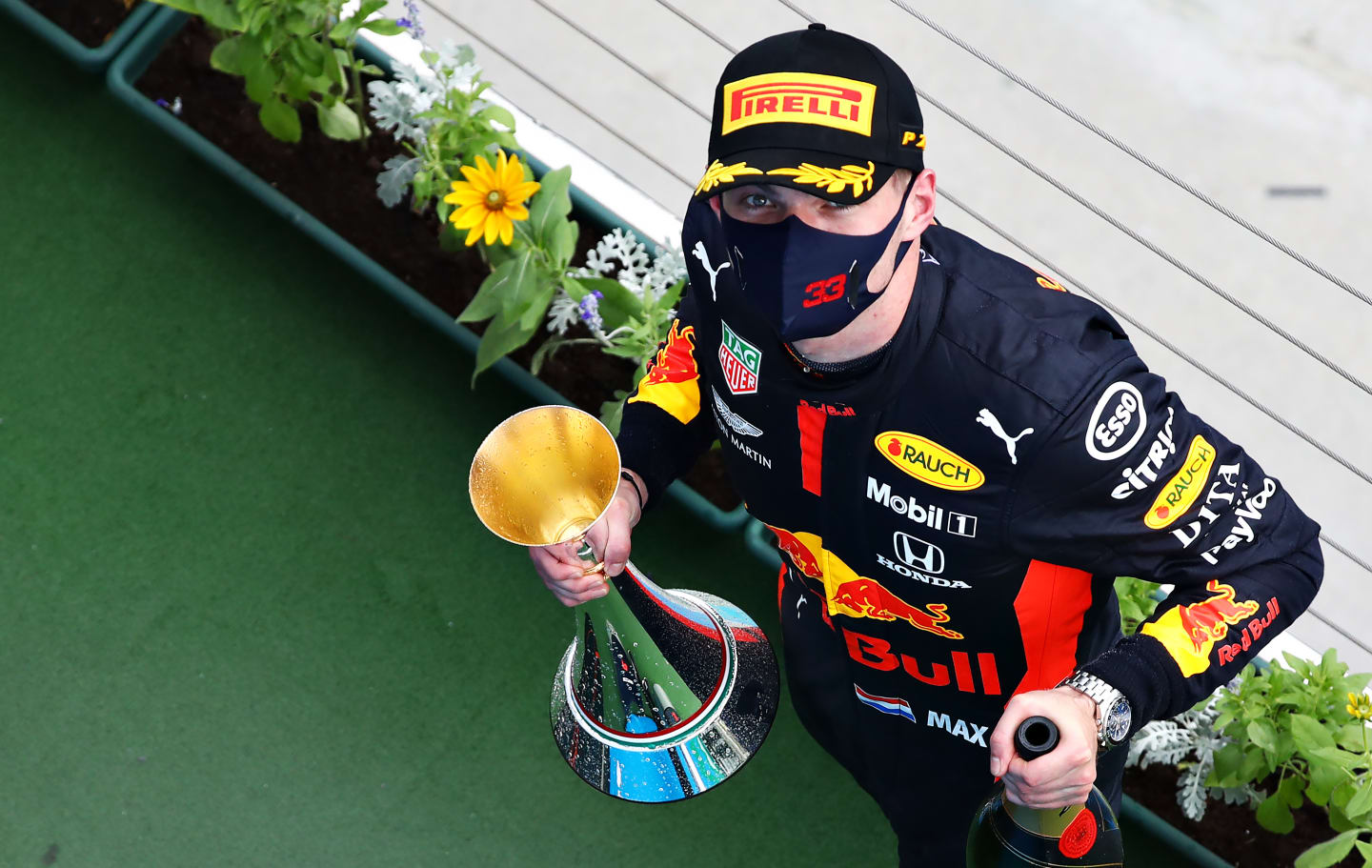 BUDAPEST, HUNGARY - JULY 19: Second placed Max Verstappen of Netherlands and Red Bull Racing celebrates on the podium during the Formula One Grand Prix of Hungary at Hungaroring on July 19, 2020 in Budapest, Hungary. (Photo by Mark Thompson/Getty Images)