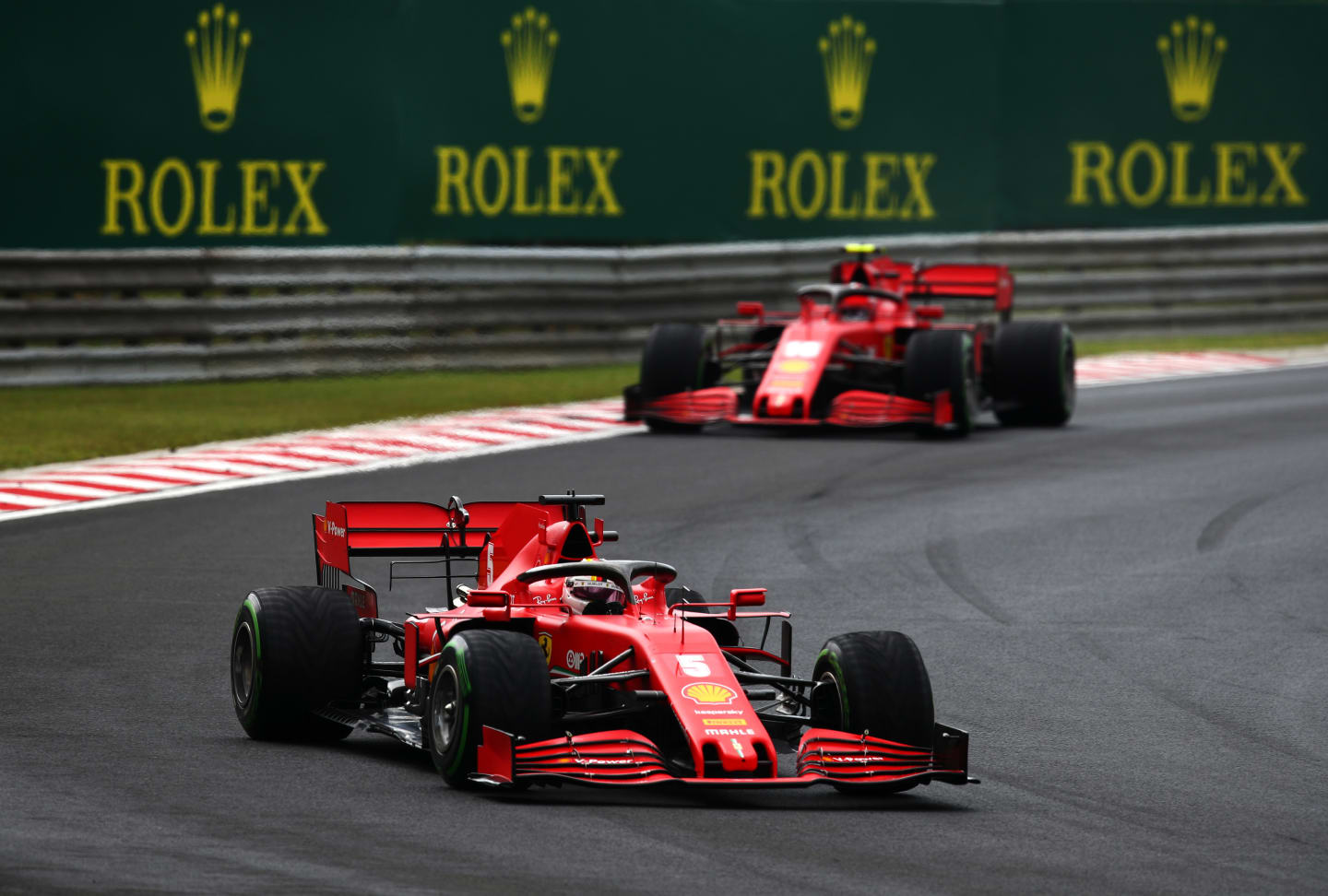 BUDAPEST, HUNGARY - JULY 19: Sebastian Vettel of Germany driving the (5) Scuderia Ferrari SF1000