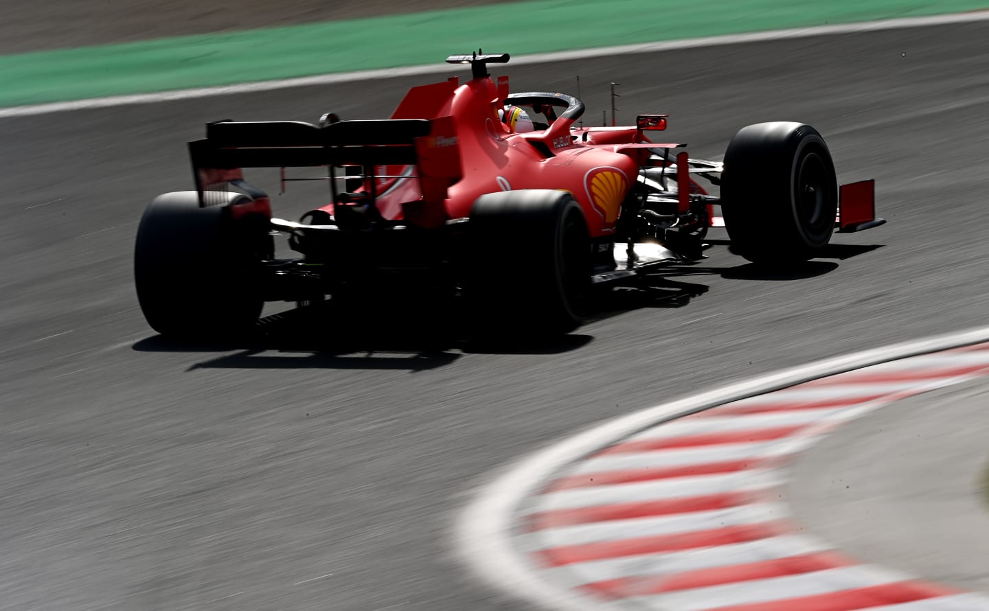 BUDAPEST, HUNGARY - JULY 19: Sebastian Vettel of Germany driving the (5) Scuderia Ferrari SF1000 on
