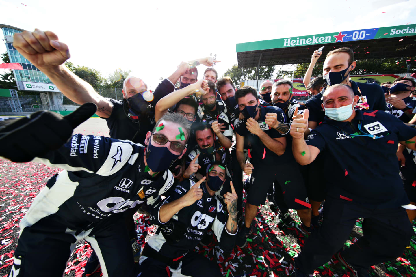 MONZA, ITALY - SEPTEMBER 06: The Scuderia AlphaTauri team celebrate the win of Pierre Gasly of France and Scuderia AlphaTauri during the F1 Grand Prix of Italy at Autodromo di Monza on September 06, 2020 in Monza, Italy. (Photo by Peter Fox/Getty Images)