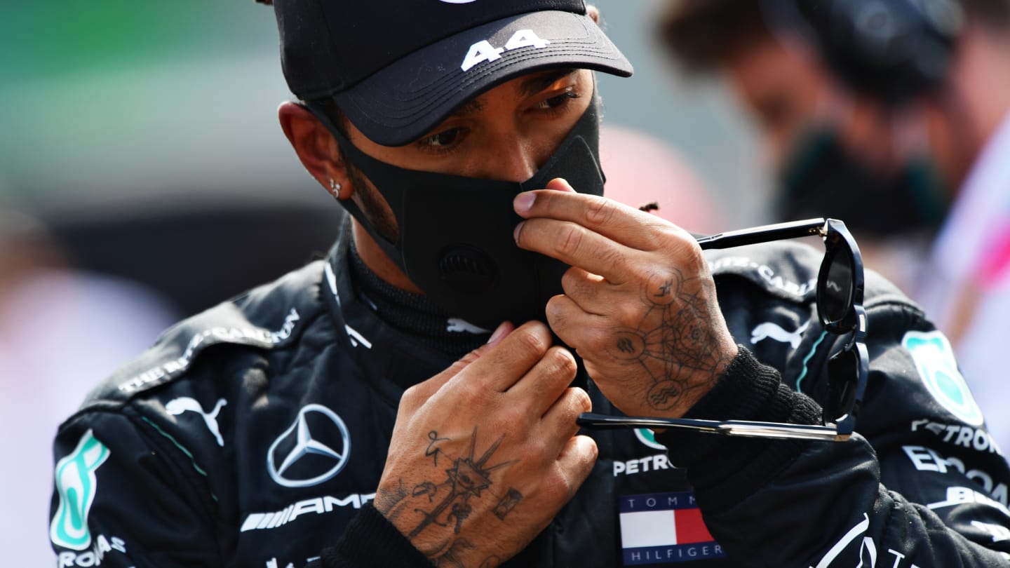 MONZA, ITALY - SEPTEMBER 06: Lewis Hamilton of Great Britain and Mercedes GP looks on during the F1