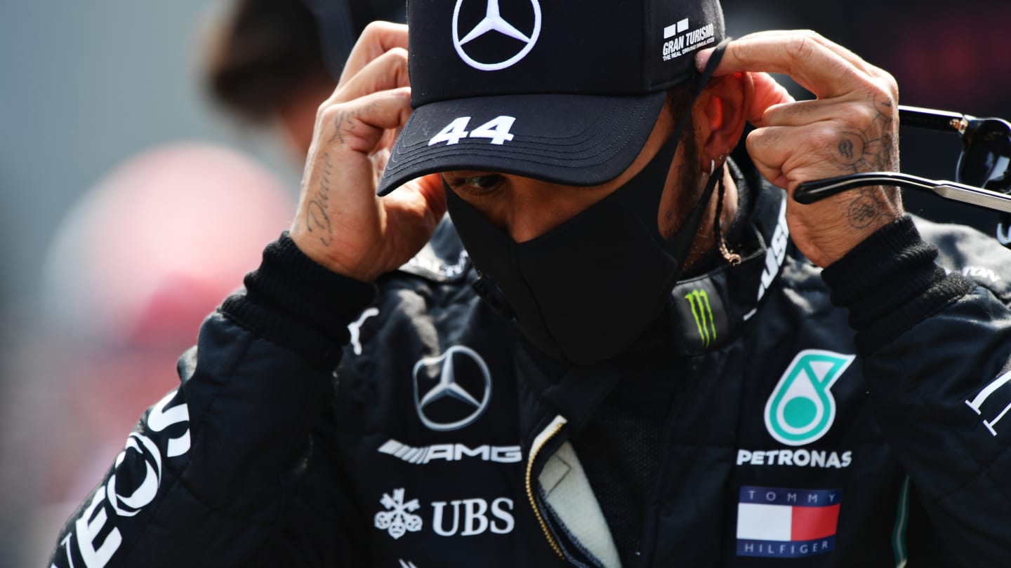 MONZA, ITALY - SEPTEMBER 06: Lewis Hamilton of Great Britain and Mercedes GP looks on during the F1