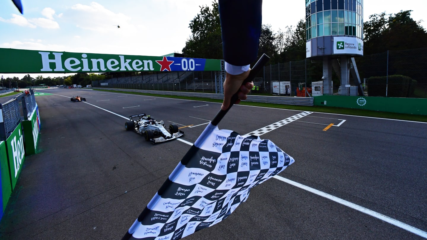 MONZA, ITALY - SEPTEMBER 06: Race winner Pierre Gasly of France driving the (10) Scuderia AlphaTauri AT01 Honda takes the chequered flag as he crosses the line during the F1 Grand Prix of Italy at Autodromo di Monza on September 06, 2020 in Monza, Italy. (Photo by Mario Renzi - Formula 1/Formula 1 via Getty Images)