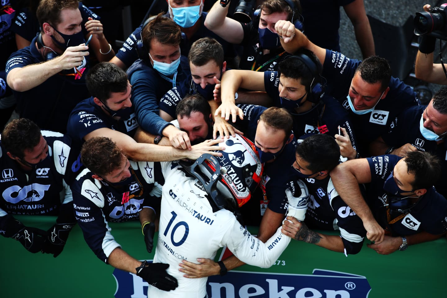 MONZA, ITALY - SEPTEMBER 06: Race winner Pierre Gasly of France and Scuderia AlphaTauri celebrates with team members in parc ferme during the F1 Grand Prix of Italy at Autodromo di Monza on September 06, 2020 in Monza, Italy. (Photo by Mark Thompson/Getty Images)