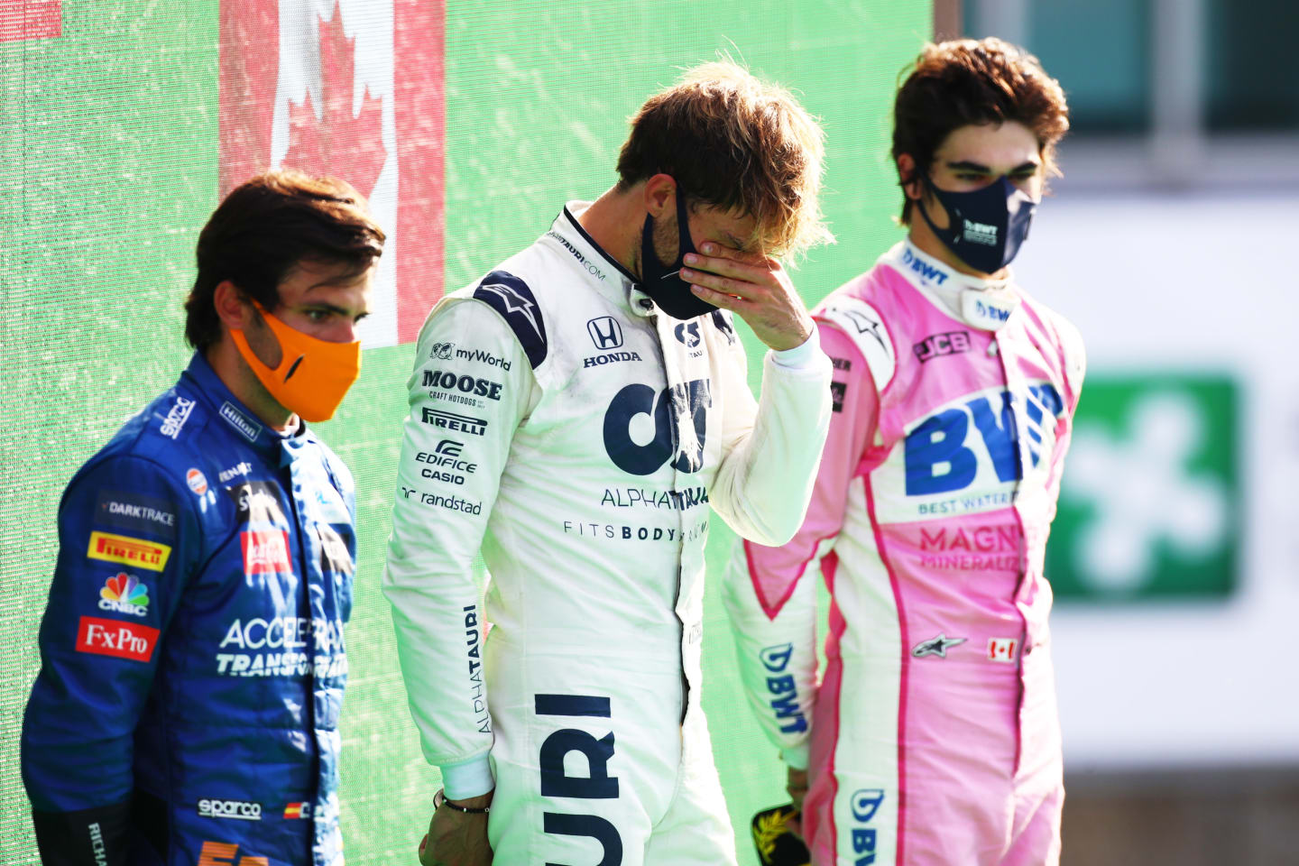 MONZA, ITALY - SEPTEMBER 06: Race winner Pierre Gasly of France and Scuderia AlphaTauri, second placed Carlos Sainz of Spain and McLaren F1 and third placed Lance Stroll of Canada and Racing Point stand on the podium during the F1 Grand Prix of Italy at Autodromo di Monza on September 06, 2020 in Monza, Italy. (Photo by Mark Thompson/Getty Images)