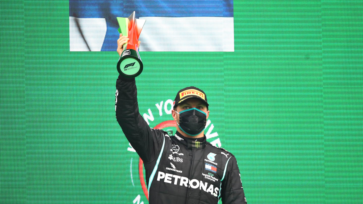 PORTIMAO, PORTUGAL - OCTOBER 25: Second placed Valtteri Bottas of Finland and Mercedes GP celebrates on the podium during the F1 Grand Prix of Portugal at Autodromo Internacional do Algarve on October 25, 2020 in Portimao, Portugal. (Photo by Bryn Lennon - Formula 1/Formula 1 via Getty Images)