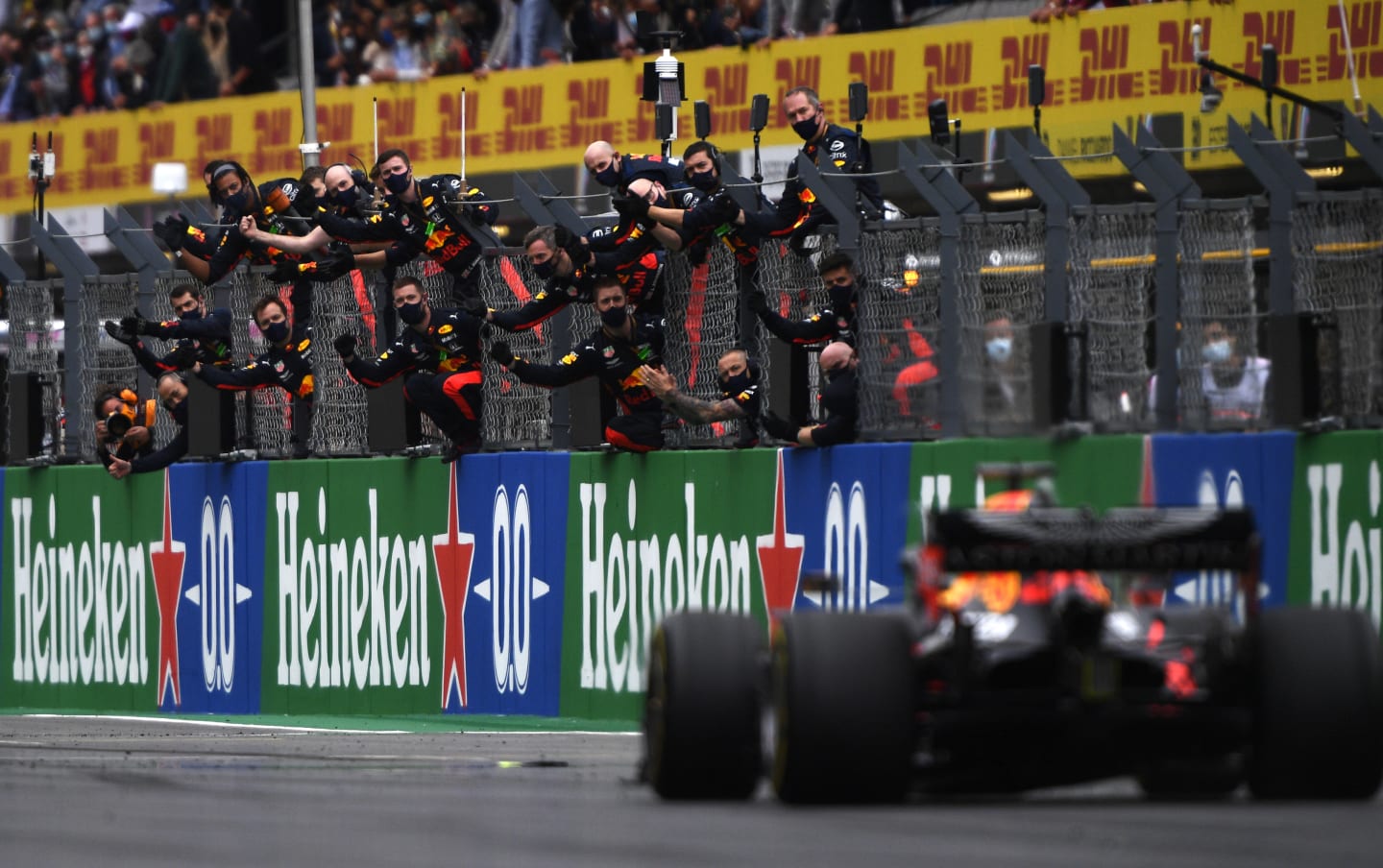 PORTIMAO, PORTUGAL - OCTOBER 25: The Red Bull Racing team celebrate on the pitwall as third placed